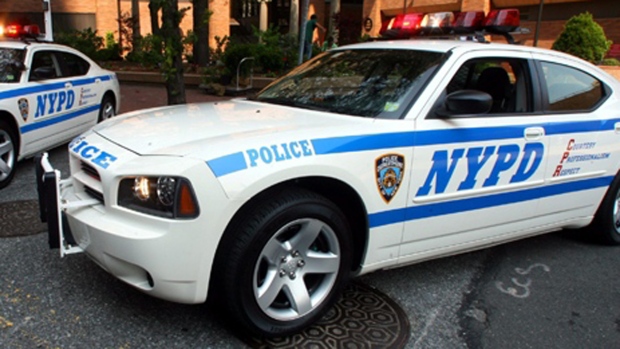 NYPD vehicles are pictured in New York on Monday, Aug. 14, 2006. (AP / Mary Altaffer)