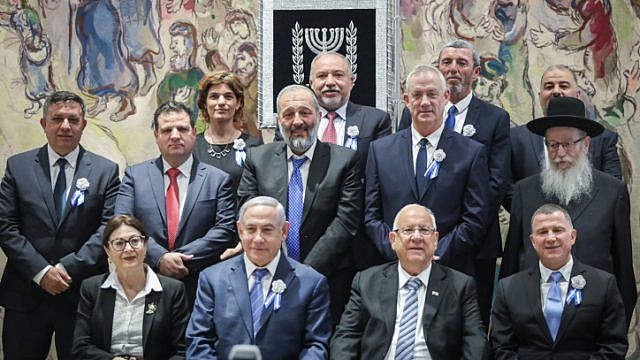 Israeli Prime Minister Benjamin Netanyahu and party leaders pose for a group picture during the swearing-in ceremony of Knesset members as a new session opens following the elections on April 30, 2019. Photo by Noam Revkin Fenton/Flash90.