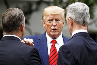 President Donald Trump pauses to talk as he leaves a ceremony with members of law enforcement on the South Lawn of the White House in Washington, Thursday, Sept. 26, 2019. The president was given a plaque of appreciation from America's Sheriffs and Angel Families. (AP Photo/Carolyn Kaster)