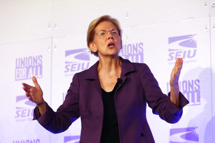 Democratic presidential candidate Sen. Elizabeth Warren, D-Mass., speaks at the SEIU Unions For All Summit on Friday, Oct. 4, 2019, in Los Angeles. (AP Photo/Ringo H.W. Chiu)