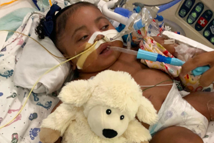 This Nov. 8, 2019 photo provided by Texas Right to Life shows Tinslee Lewis. On Thursday, Jan. 2, 2020, a Texas judge sided with a hospital that plans to remove the 11-month-old girl from life support after her mother disagreed with the decision by doctors who say the infant is in pain and that her condition will never improve. (Courtesy of Texas Right to Life via AP)