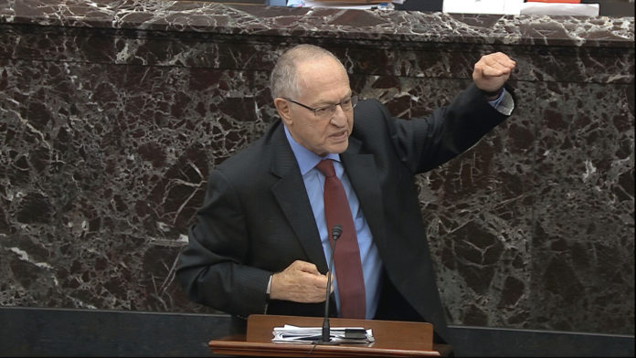 In this image from video, Alan Dershowitz, an attorney for President Donald Trump, answers a question during the impeachment trial against Trump in the Senate at the U.S. Capitol in Washington, Wednesday, Jan. 29, 2020. (Senate Television via AP)