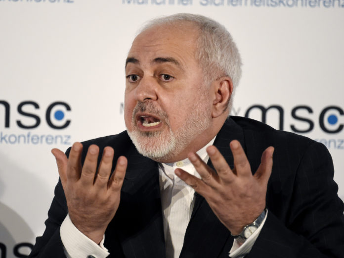 Iranian Foreign Minister Mohammad Javad Zarif speaks on the second day of the Munich Security Conference in Munich, Germany, Saturday, Feb. 15, 2020. (AP Photo/Jens Meyer)