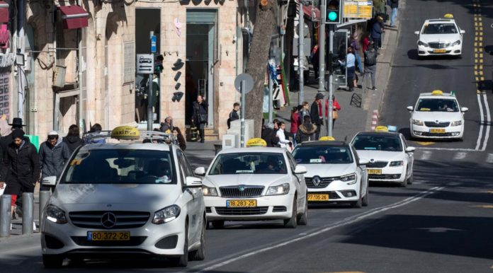 Taxis in a public transportation lane in Jerusalem, Dec. 31, 2019. (Olivier Fitoussi/Flash90)