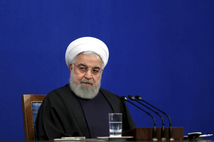Iran's President Hassan Rouhani gives a press conference in Tehran, Iran, Sunday, Feb. 16, 2020. (AP Photo/Ebrahim Noroozi)