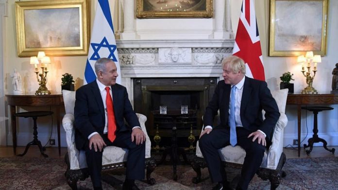 British Prime Minister Boris Johnson and Israeli Prime Minister Benjamin Netanyahu in London on Sept. 5, 2019. Photo by Chaim Tzach/GPO.