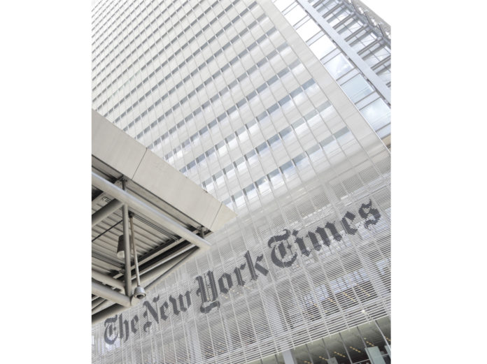 FILE - This June 22, 2019 file photo shows the exterior of the New York Times building in New York. The New York Times says it was wrong to trust the story of a Canadian man whose claims of witnessing and participating in atrocities as a member of the Islamic State was a central part of its award-winning 2018 podcast “Caliphate.” The 12-part series won a Peabody Award and was a Pulitzer Prize finalist. But it began to unravel when Canadian authorities in September arrested Shehroze Chaudhry on charges of perpetrating a terrorist hoax. He was included in the podcast under the alias Abu Huzayfah. The Times said its journalists should have done a better job vetting him, and not included his story as part of the podcast. (AP Photo/Julio Cortez, File)