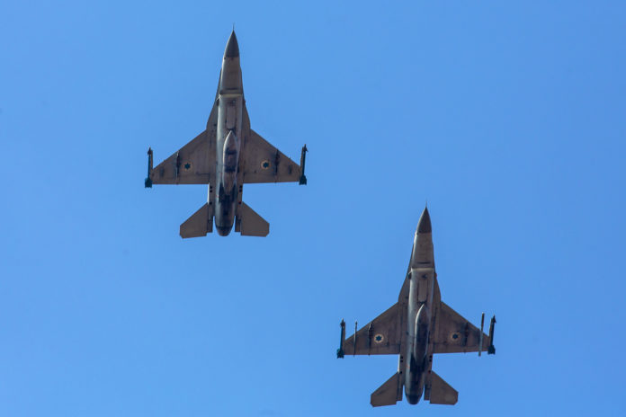 FILE - F16 jets fly above the Herzeliya airport on November 15, 2019. Photo by Moshe Shai/Flash9
