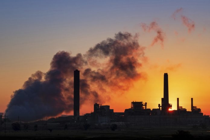 FILE - The Dave Johnson coal-fired power plant is silhouetted against the morning sun in Glenrock, Wyo., Friday, July 27, 2018. The Trump administration has weakened an Obama-era rule aimed at stopping coal plant pollution that has contaminated streams, lakes and underground aquifers. The changes finalized Monday, Aug. 31, 2020, will allow utilities to use cheaper wastewater cleanup technologies and take longer to comply with pollution reduction guidelines adopted in 2015. Its the latest in a string of regulatory rollbacks for the coal power industry under Trump. (AP Photo/J. David Ake, File)