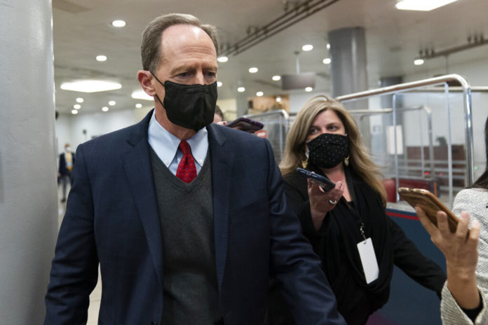 Sen. Pat Toomey, R-Pa., departs on Capitol Hill in Washington, Saturday, Feb. 13, 2021, after the Senate acquitted former President Donald Trump in his second impeachment trial in the Senate at the U.S. Capitol in Washington, Saturday, Feb. 13, 2021. Trump was accused of inciting the Jan. 6 attack on the U.S. Capitol, and the acquittal gives him a historic second victory in the court of impeachment. (AP Photo/Alex Brandon)