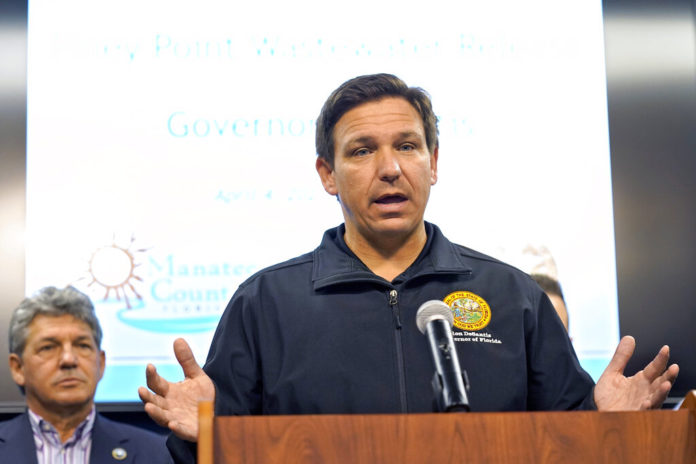 Florida Gov. Ron DeSantis gestures during a news conference Sunday, April 4, 2021, at the Manatee County Emergency Management office in Palmetto, Fla. DeSantis has received a single-dose coronavirus vaccine. His office confirmed Wednesday, April 7, 2021 that the Republican governor got the Johnson & Johnson vaccine, which requires only a single dose. (AP Photo/Chris O'Meara, file)